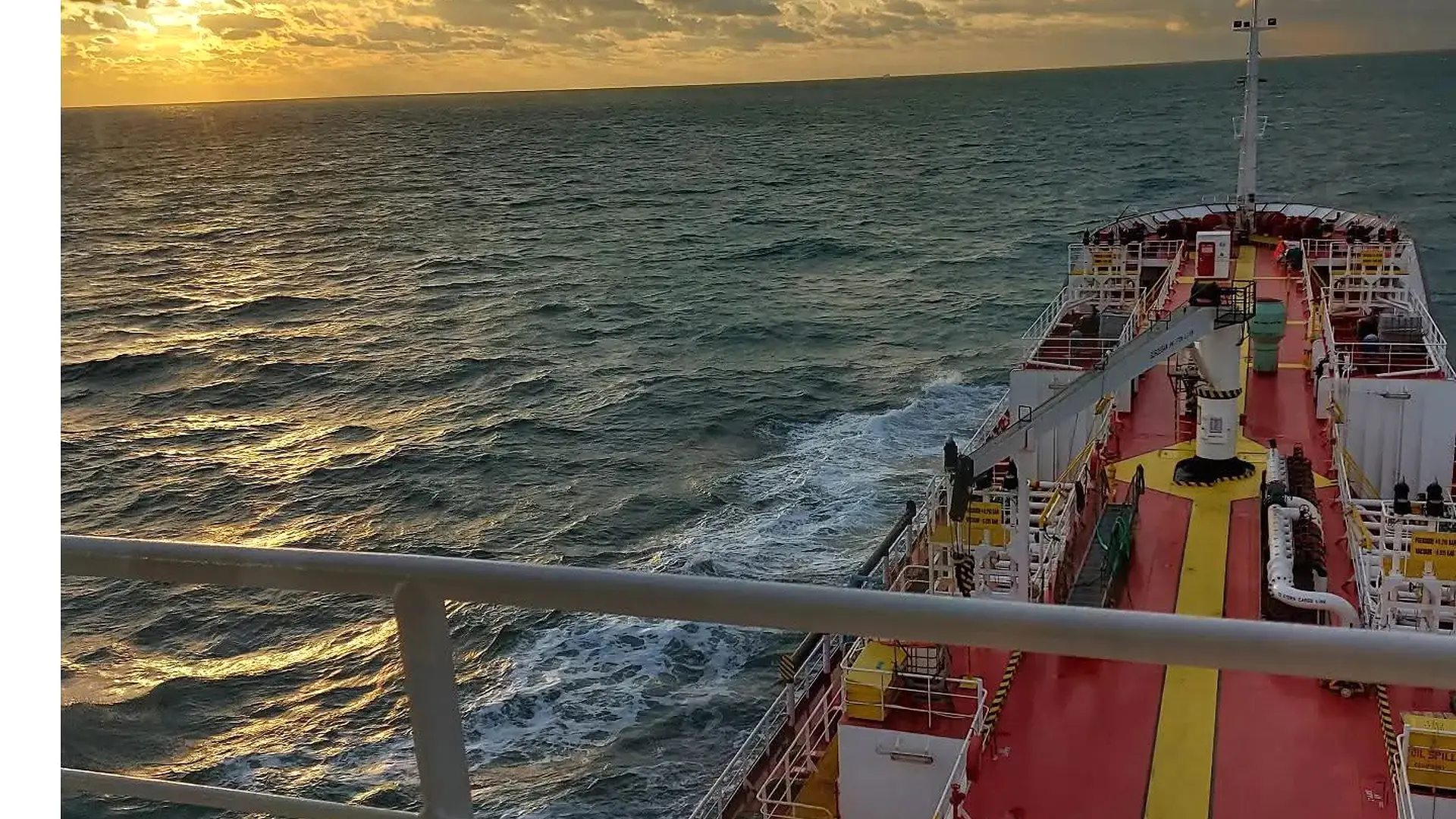Gas carrier underway at sunset